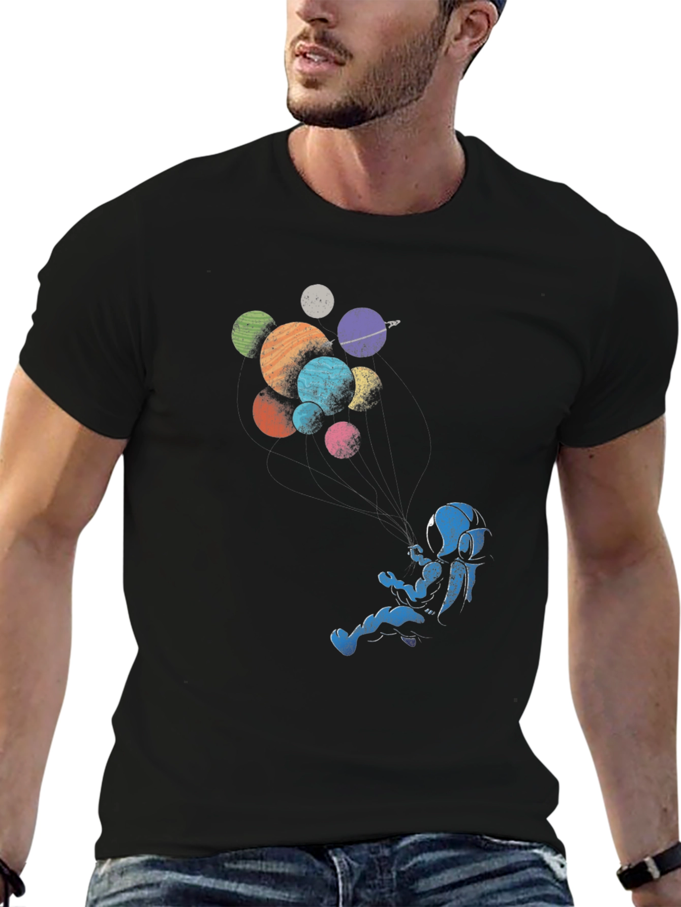 Astronaut Floating Among Planets Graphic Tee