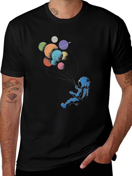 Astronaut Floating Among Planets Graphic Tee