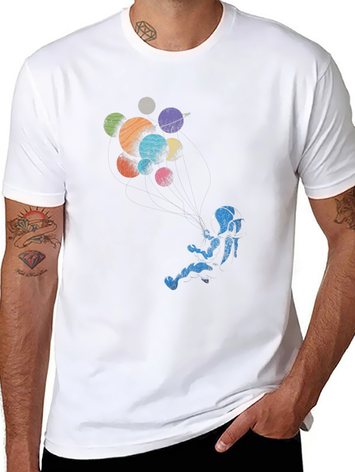 Astronaut Floating Among Planets Graphic Tee